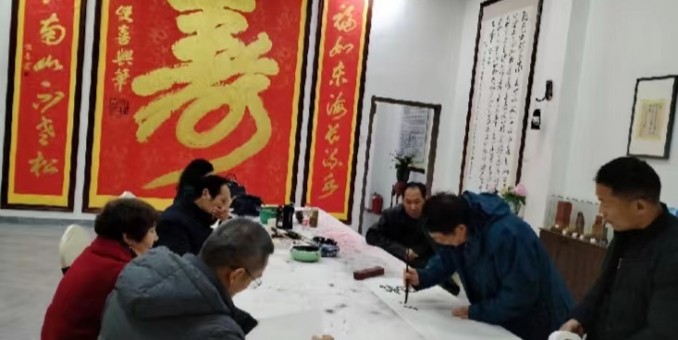 揮毫潑墨播祥瑞  和合天人祈稔豐